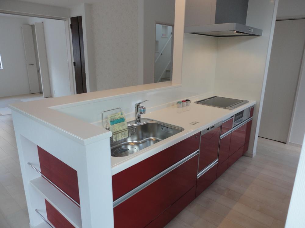 Kitchen. Bright and soft shades of flooring ・ Vivid Island kitchen shine Some of joinery. IH heater, Sirocco fan, Dishwasher, Soft-close, All equipment already is such as water purification function!