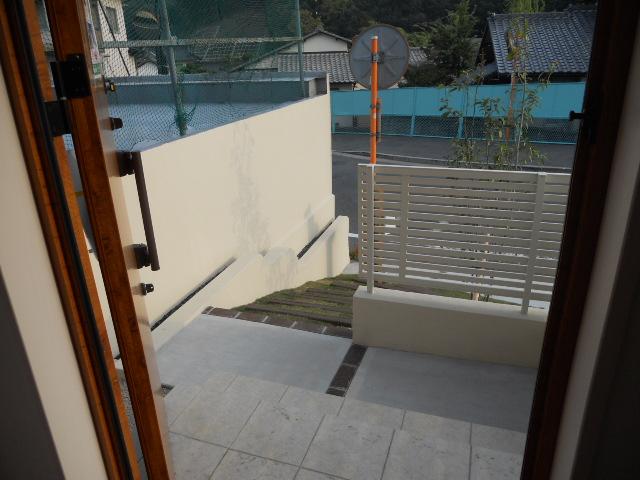 Balcony. I looked out from the front door. 