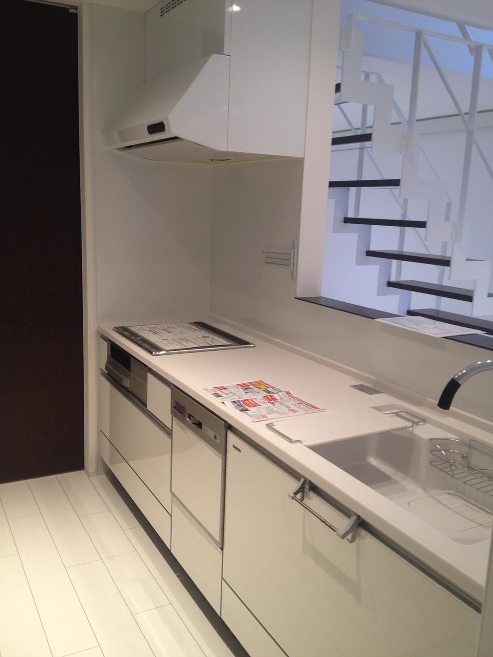 Kitchen. Kitchen leading to the basin