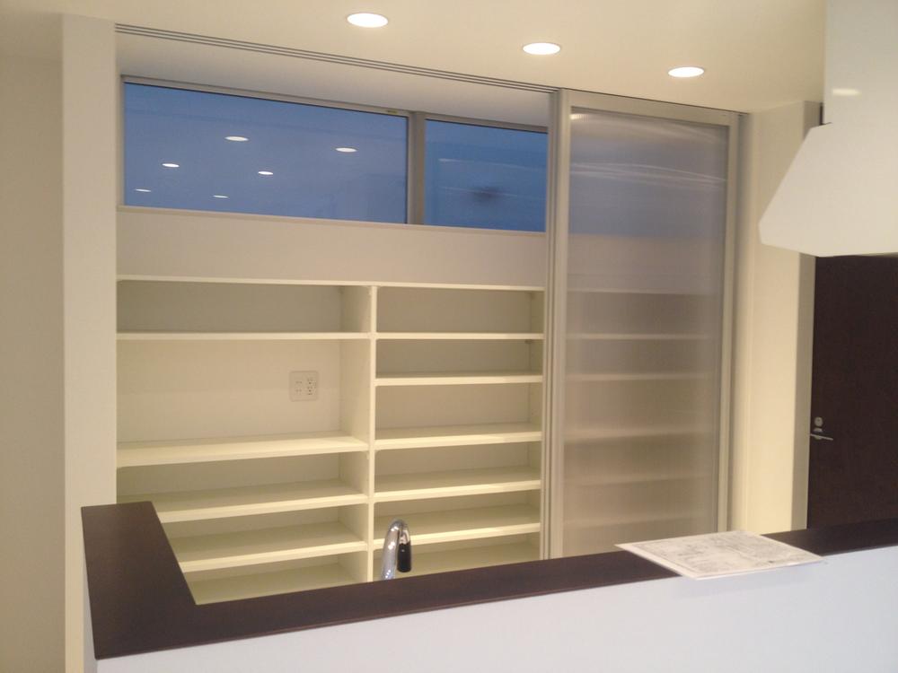 Receipt. It is a cupboard in the kitchen behind