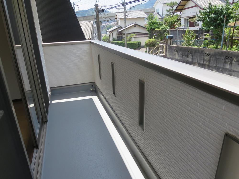 Balcony. We copy the south from the second floor