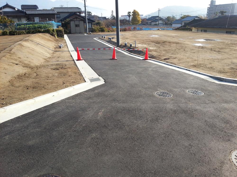 Local photos, including front road. Residential land completed!