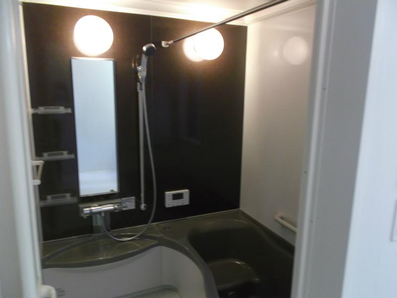 Bathroom. Chic shades of bathroom with heating dryer. Warm even in winter