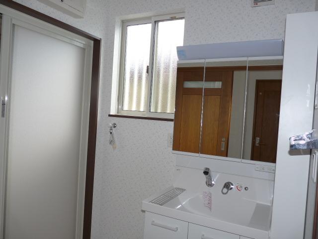 Wash basin, toilet. Shampoo dresser month