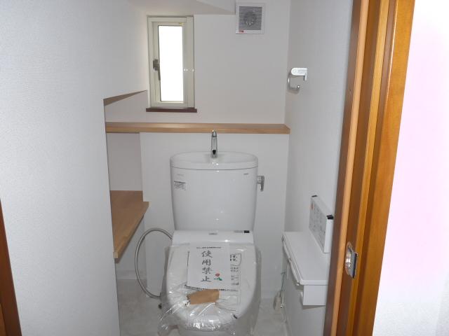 Toilet. Heated toilet seat