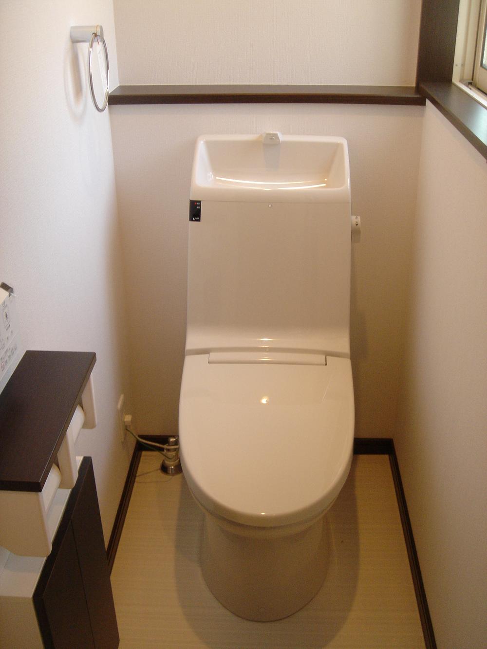 Washlet is about, The next there is a storage box. 