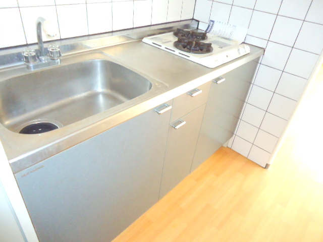 Kitchen. Gas stove also there is also a cooking space in a two-necked!