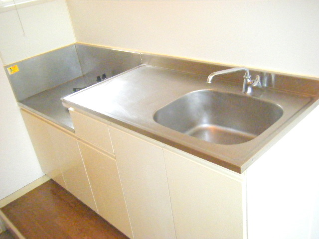 Kitchen. Put gas stove 2-neck!