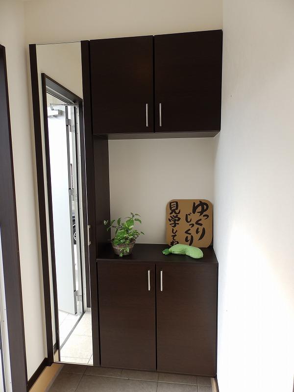 Entrance. There are plenty of front door storage