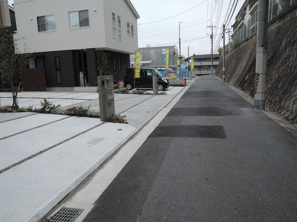 Local photos, including front road. Happy to be out of the car because the front road wide