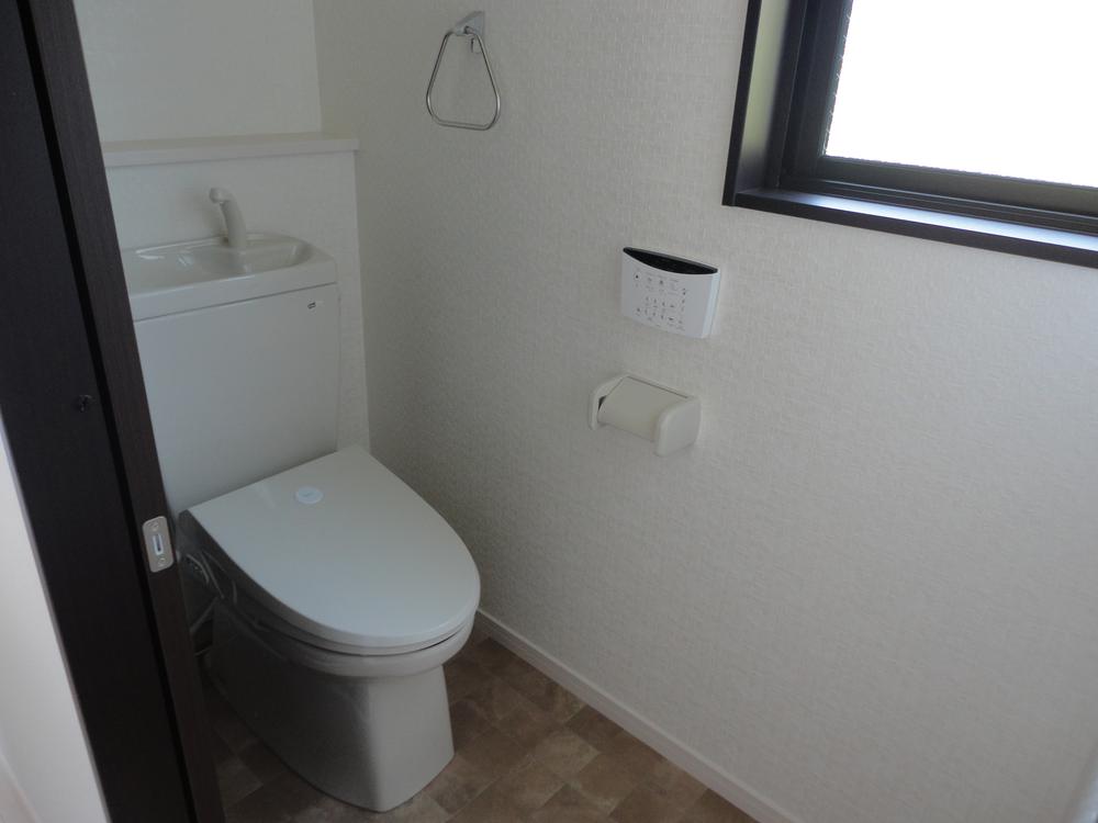 Toilet. Plenty of lighting in toilet! Towel rack, Remote control equipment! 