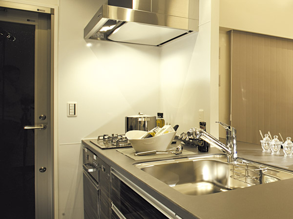 Kitchen.  [Kitchen surface material] Paste the kitchen surface material of melamine decorative plates on the front and side, We produce a design specific sense of unity with the dining.