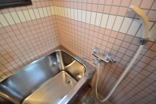 Bath. There is a window in bathroom