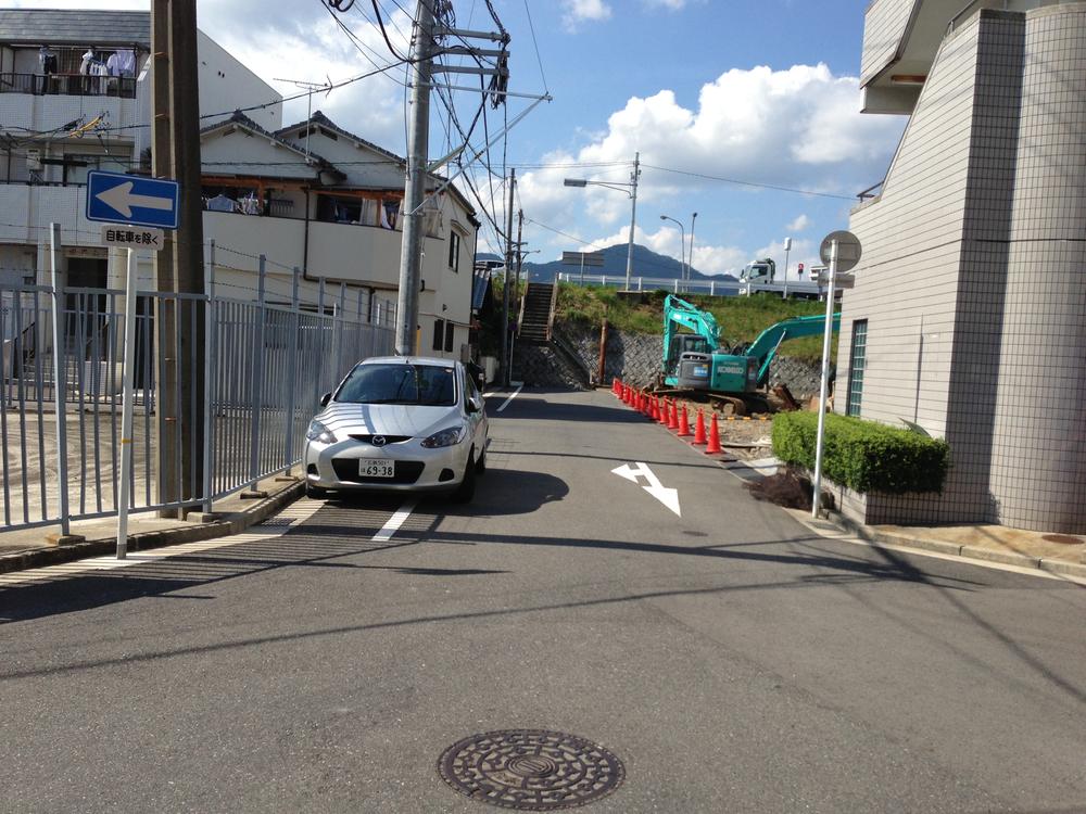 Local photos, including front road. Front road (northeast 5.9m)