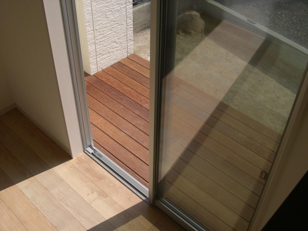 Other. Wood deck that follows the dining