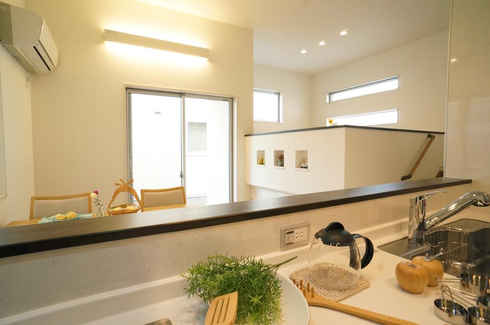 Kitchen. When you look at the living room "on the diagonal" from the kitchen. Rhythm is born in space.