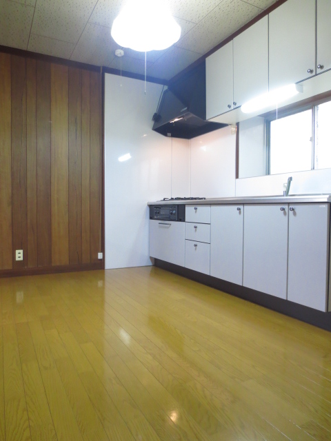 Living and room. It is not quite in such a large kitchen