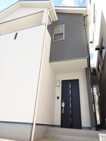 Entrance. It celebrates the family in the stylish front door