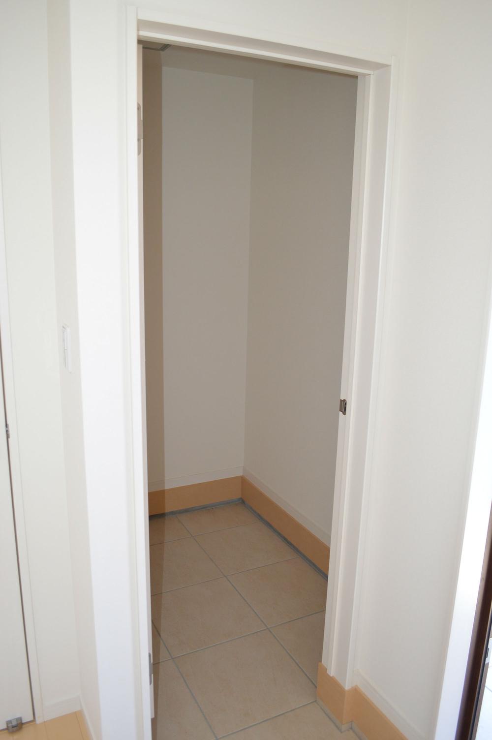 Receipt. Big shoes cloak the entrance side