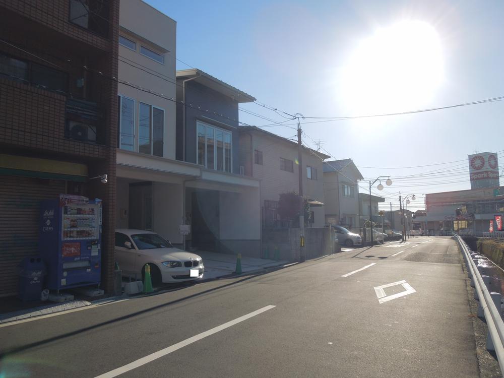 Local photos, including front road. Super within walking distance