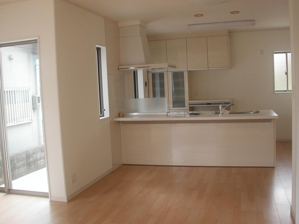 Living. Overlooking the kitchen from the living room