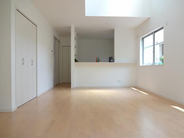 Living. Also it deepens ties of family in a bright living room with vaulted ceiling