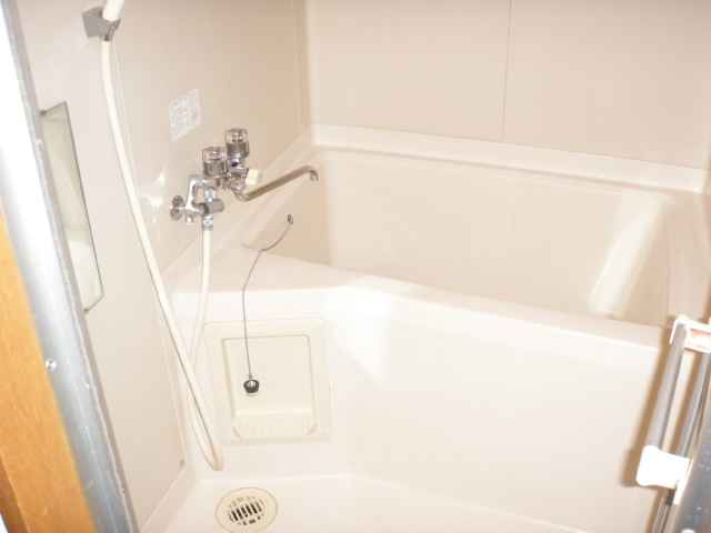 Bath. It is a photograph of the bathroom