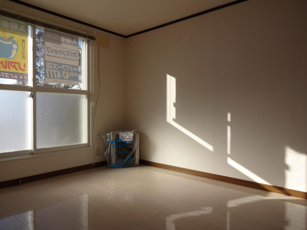 Living and room. Bright sunlight coming through the large windows