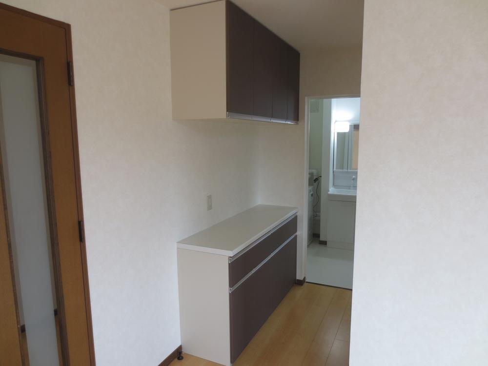 Kitchen. The kitchen is next to the cupboard newly established. 