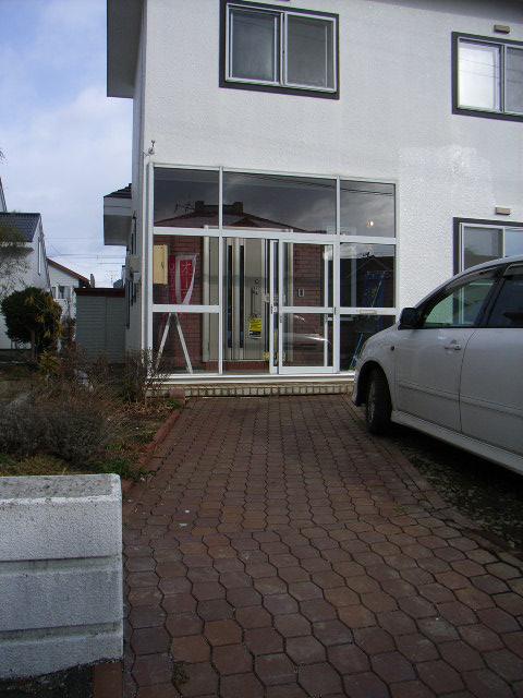 Local appearance photo. Way to the door is serviced by interlocking