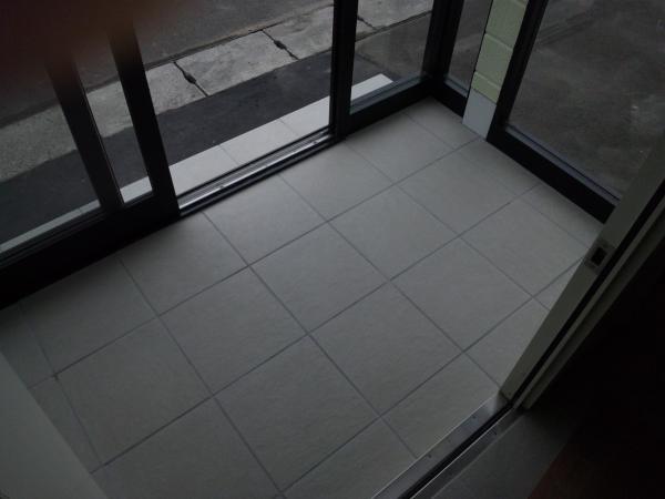 Entrance. Worry winter at the door hooded