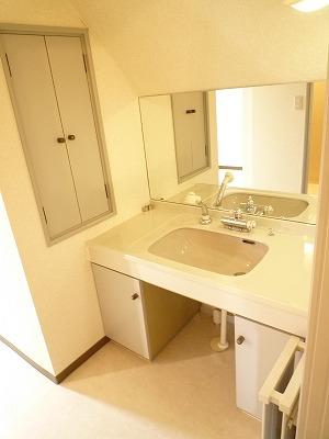 Wash basin, toilet. Second floor washroom