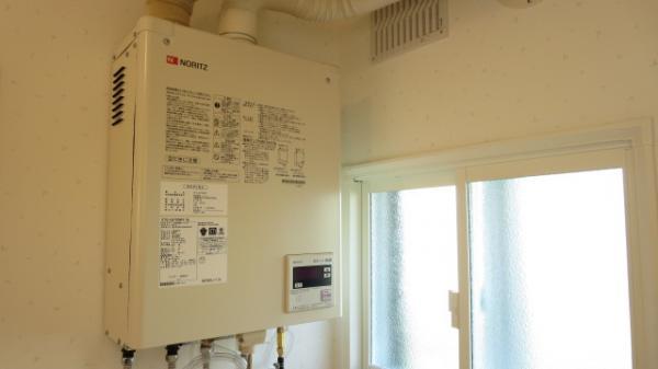 Wash basin, toilet. There is no wasted space because the hot water boiler wall-mounted boilers