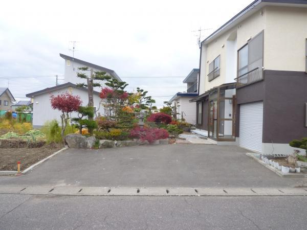 Parking lot. It is parking space pavement.