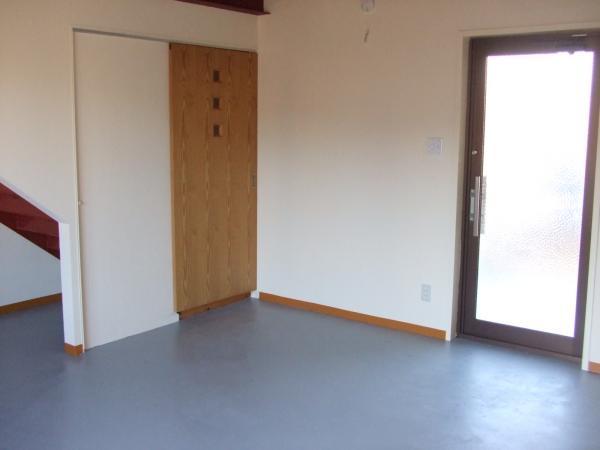 Kitchen. Wooden door on the left is connected to the entrance