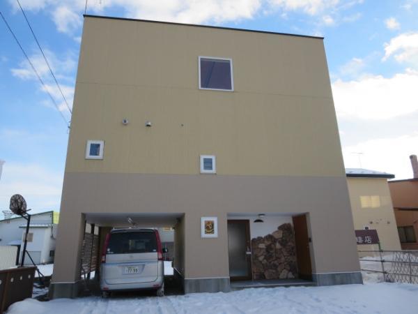 Local appearance photo. Piloti on the first floor part. The entrance is north