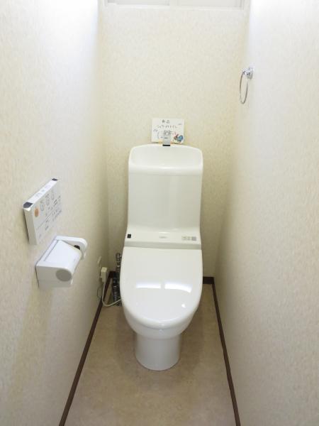 Toilet. Toilet with brand new shower There was also toilet seat