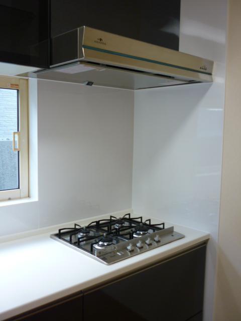 Kitchen. Gas stove and ventilator