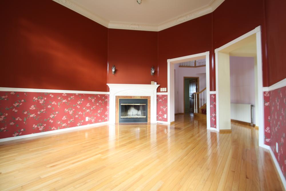 Living. There is a longing of the fireplace in the living. 