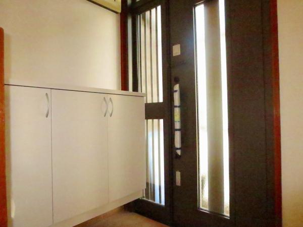 Entrance. The shoebox now bright entrance by the white