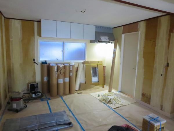 Kitchen. Kitchen of how white kitchen of hanging cupboard and range hood during the renovation has been installed