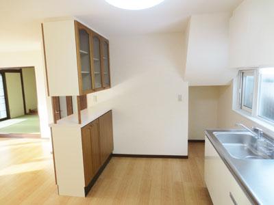 Kitchen. Handy for storage, such as tableware and cooking utensils in with cupboard!