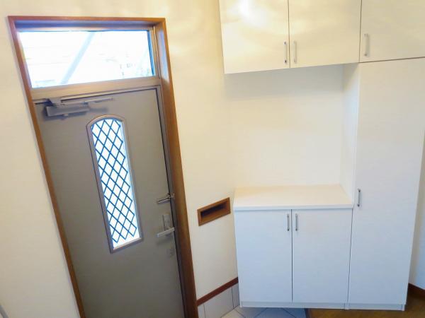 Entrance. So it was replaced with white shoe box, Now bright entrance.