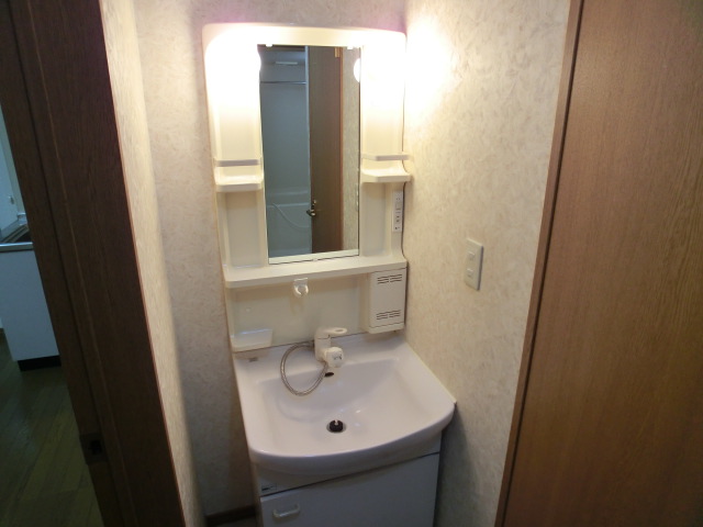 Washroom. There and happy shampoo dresser