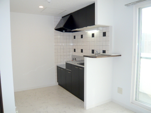 Kitchen. Photos are separate in Room.