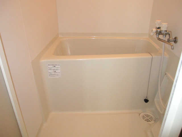 Bath. Photos are separate in Room.