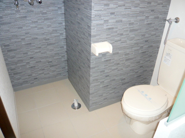 Toilet. Photos are separate in Room.