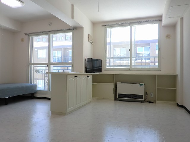 Living and room. Counter table is excellent functionality! 