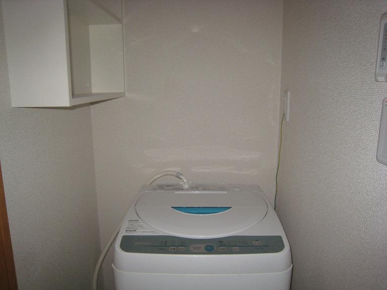 Other Equipment. There are washing machine storage in the room.