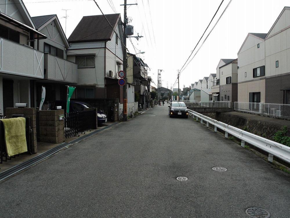 Local photos, including front road. You away more than 14m from the front building in width 7m + waterway 7m